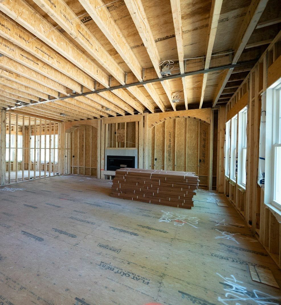 a room with a wood floor and a bench